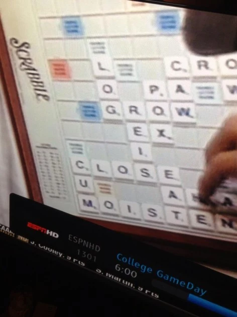 Moisten Barret Jones Playing Scrabble