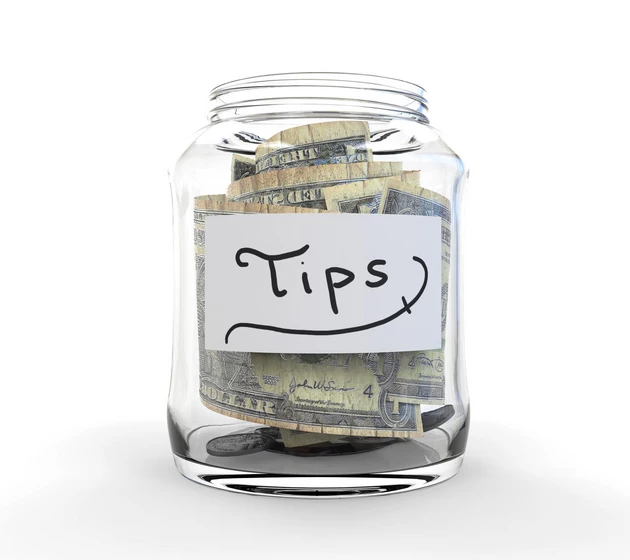 Jar for Tips with Money isolated on white background. 3D render